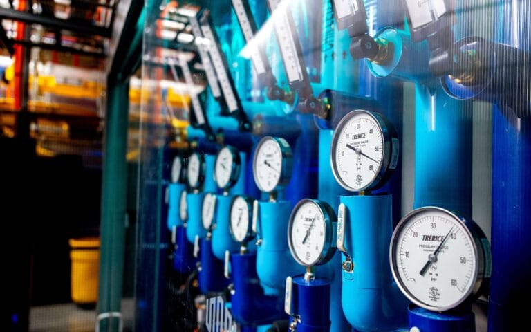 AI News 6 close up of several pressure gauges for a liquid cooling system at equinix data center